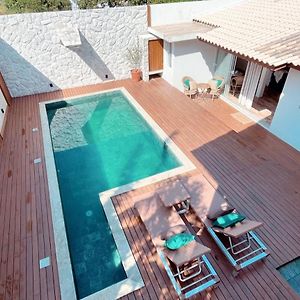 Casa com piscina e acesso a pé à Praia do Santinho